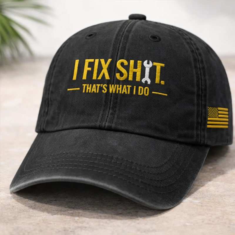 Vintage washed baseball cap embroidered with bold text reading I FIX SHIT with a crossed wrench and screwdriver icon